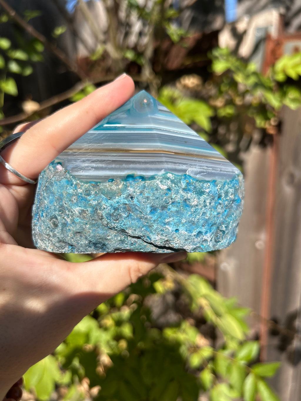 Dyed blue/teal agate half polished