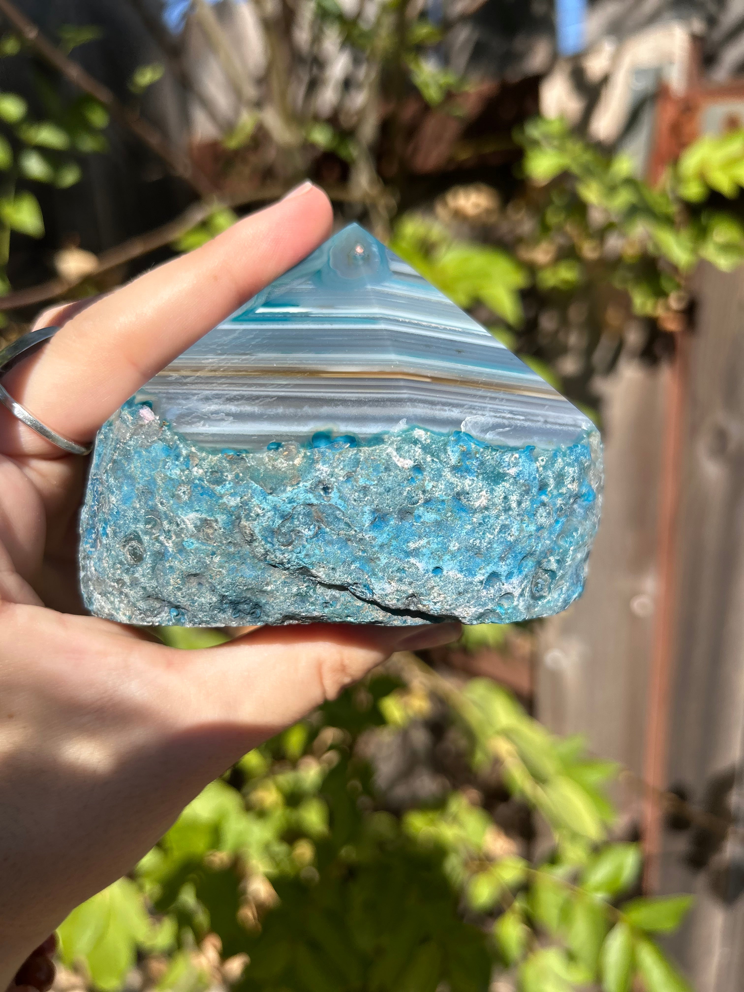 Dyed blue/teal agate half polished