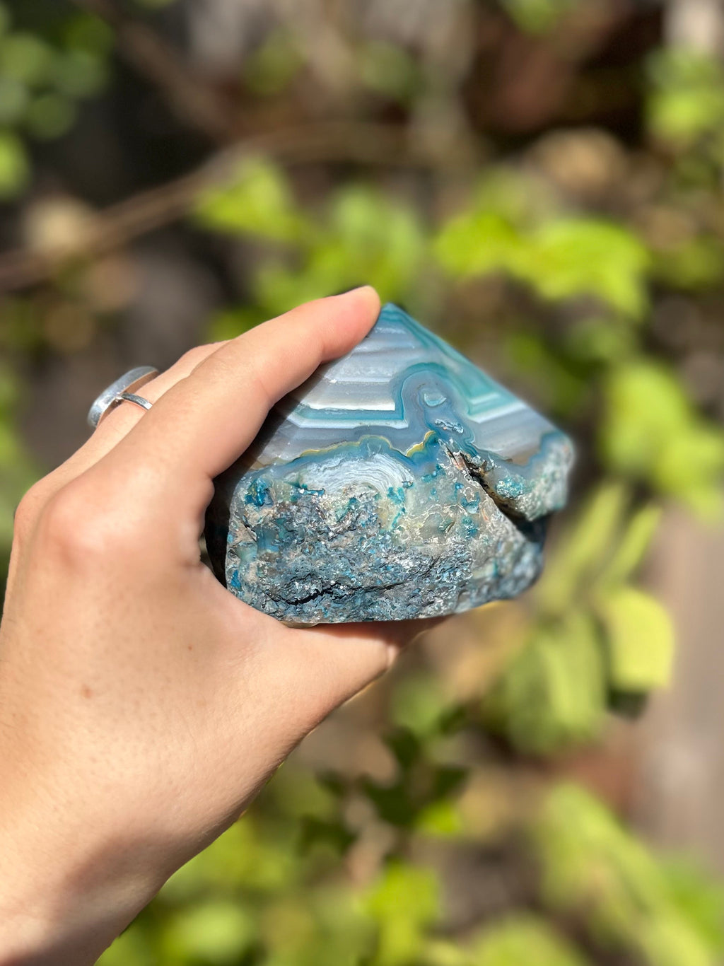 Dyed blue/teal agate half polished